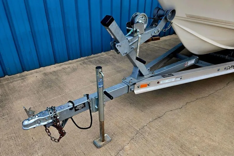 Slide: The Image of Trailer hitch of 2023 Key West 188 Bay Reef boat, parked on concrete. - 14