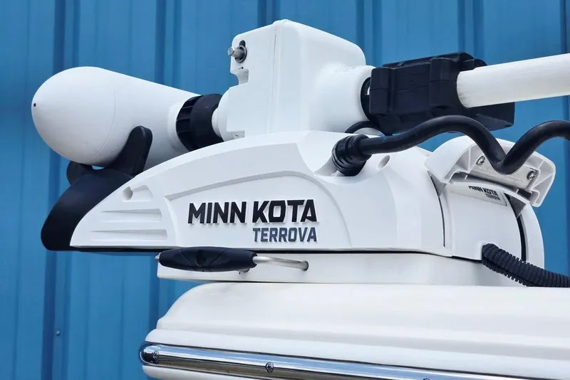 Slide: The Image of Minn Kota Terrova motor on 2023 Key West 188 Bay Reef boat, blue background. - 16