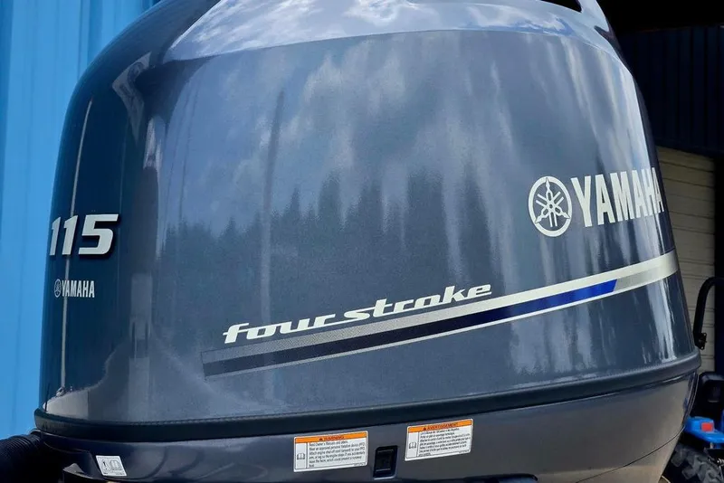 Slide: The Image of Yamaha 115 four-stroke outboard motor on 2023 Key West 188 Bay Reef boat. - 12