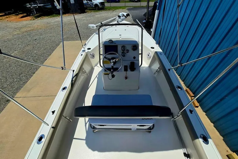 Slide: The Image of 2023 Key West 188 Bay Reef boat interior with steering console and seating. - 47