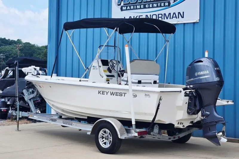 Slide: The Image of 2023 Key West 188 Bay Reef boat with Yamaha engine on trailer at marine center. - 3