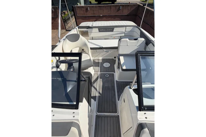 Slide: The Image of 2018 Bayliner VR5 Bowrider I/O interior with seating and steering wheel. - 17