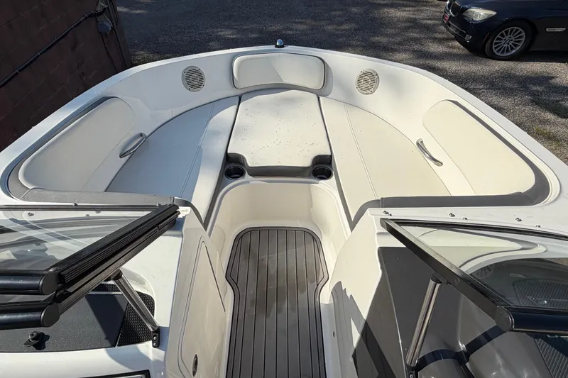 Slide: The Image of 2018 Bayliner VR5 Bowrider I/O interior with spacious seating and cup holders. - 19