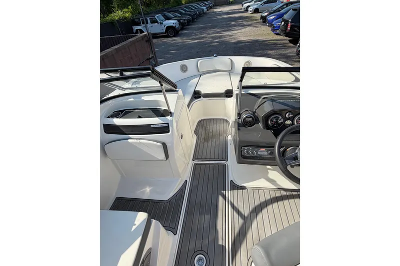 Slide: The Image of 2018 Bayliner VR5 Bowrider I/O interior with sleek dashboard and seating. - 18