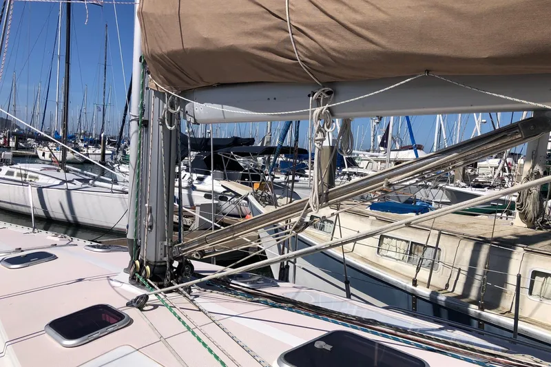 Slide: The Image of Sailboat marina view featuring a 1999 Catalina 400 with rigging and masts. - 16