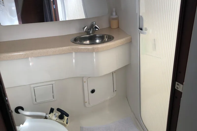 Slide: The Image of Bathroom interior of a 1999 Catalina 400 yacht with sink and shower. - 8