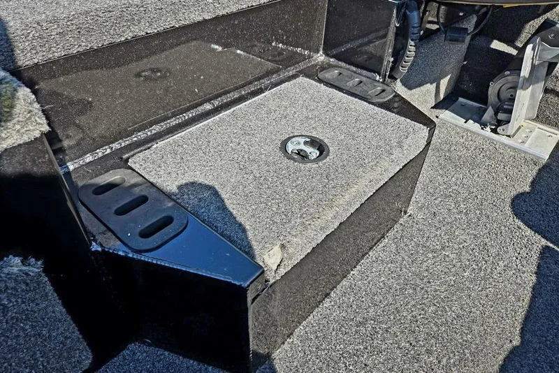 Slide: The Image of 2022 Vexus AVX1980 boat interior with carpeted flooring and storage compartment. - 22
