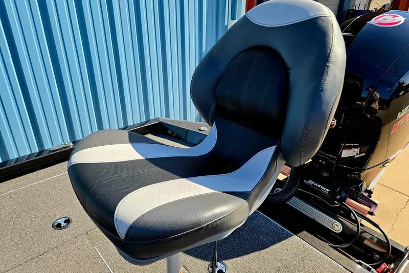 Slide: The Image of 2022 Vexus AVX1980 boat seat with black and white design, near a blue wall. - 48