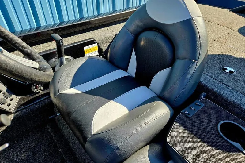 Slide: The Image of 2022 Vexus AVX1980 boat interior with gray and white cushioned seat. - 31