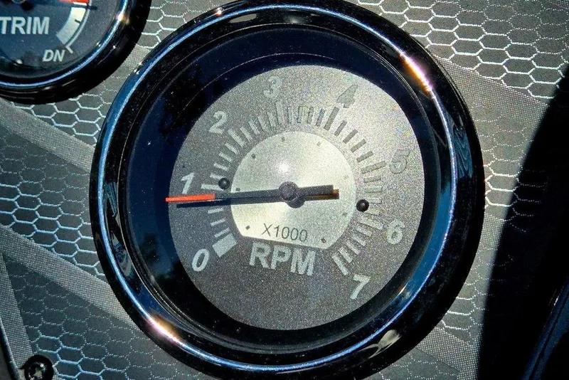 Slide: The Image of Close-up of 2022 Vexus AVX1980 RPM gauge on a textured dashboard. - 34