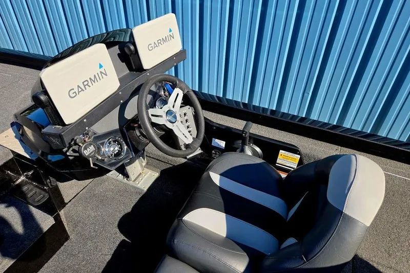 Slide: The Image of 2022 Vexus AVX1980 boat cockpit with Garmin displays and steering wheel. - 33