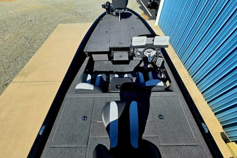 Slide: The Image of 2022 Vexus AVX1980 boat interior with Garmin displays and seating. - 52