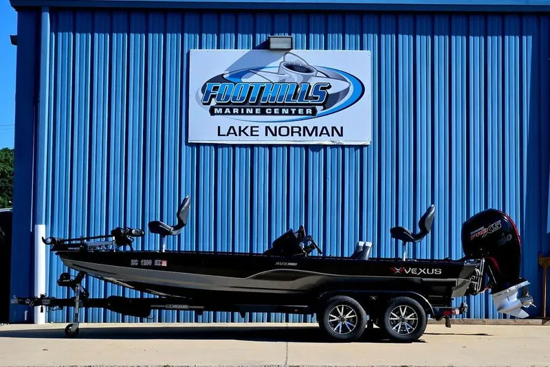 The Image of 2022 Vexus AVX1980 boat at Foothills Marine Center, Lake Norman, with blue building backdrop. - 2