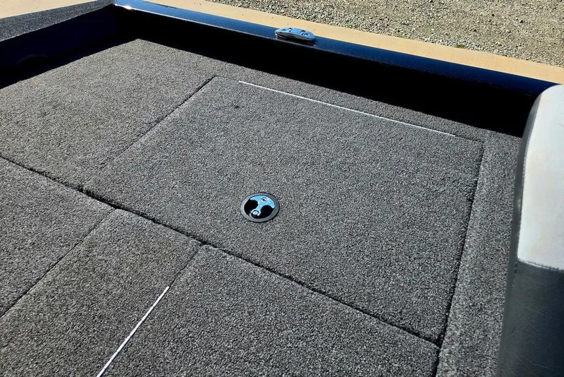 Slide: The Image of Carpeted deck of a 2022 Vexus AVX1980 boat with storage compartment. - 45