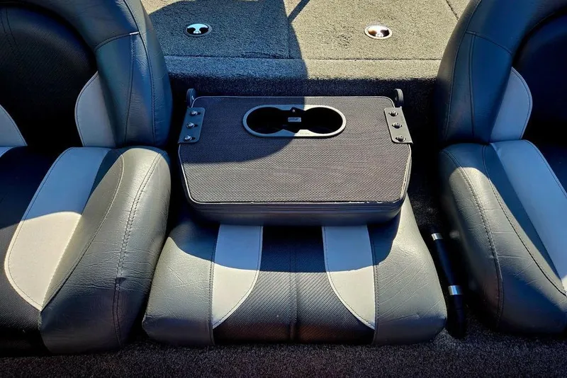 Slide: The Image of 2022 Vexus AVX1980 boat interior with gray seats and center console cup holders. - 30