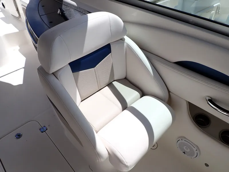 Slide: The Image of 2011 Chaparral 287 SSX boat seat, white and blue upholstery, luxurious design. - 40