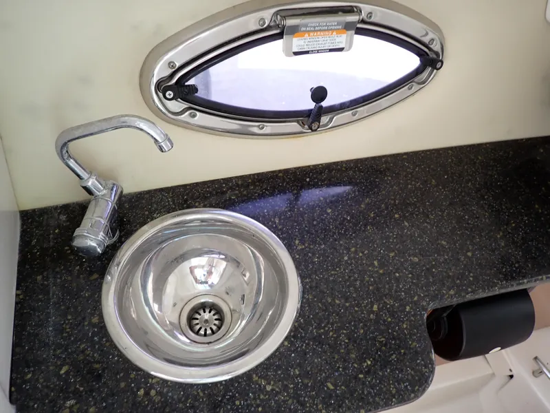 Slide: The Image of Stainless steel sink and faucet on Chaparral 287 SSX boat, 2011 model. - 47