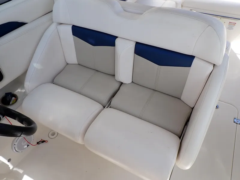 Slide: The Image of White and blue seating on 2011 Chaparral 287 SSX boat. - 39
