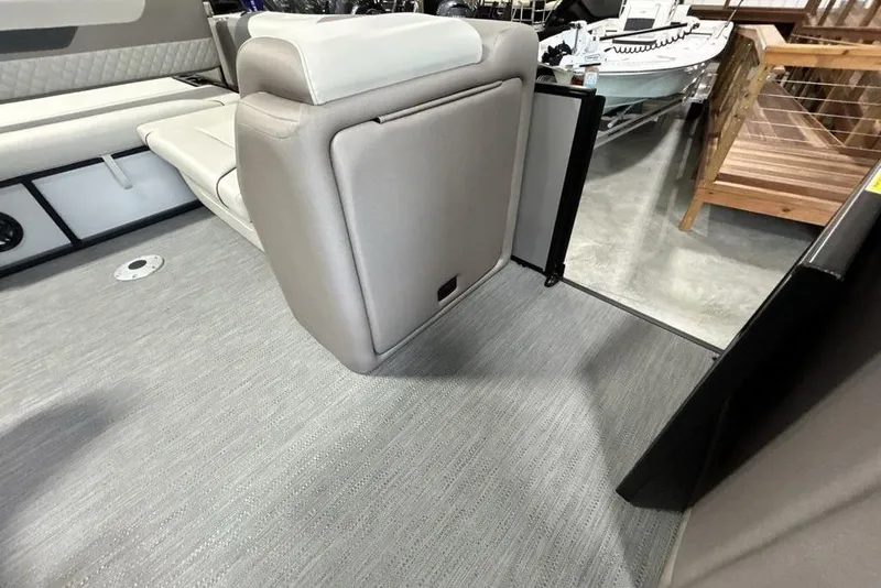 Slide: The Image of Interior of 2026 Godfrey Sweetwater 2286 SFL boat, featuring plush seating and modern flooring. - 15