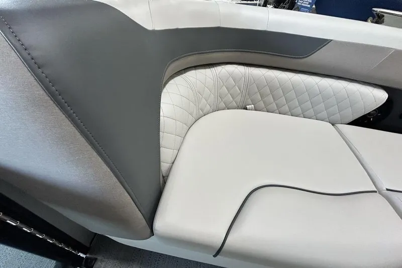 Slide: The Image of Luxurious seating detail of 2026 Godfrey Sweetwater 2286 SFL boat with quilted upholstery. - 2