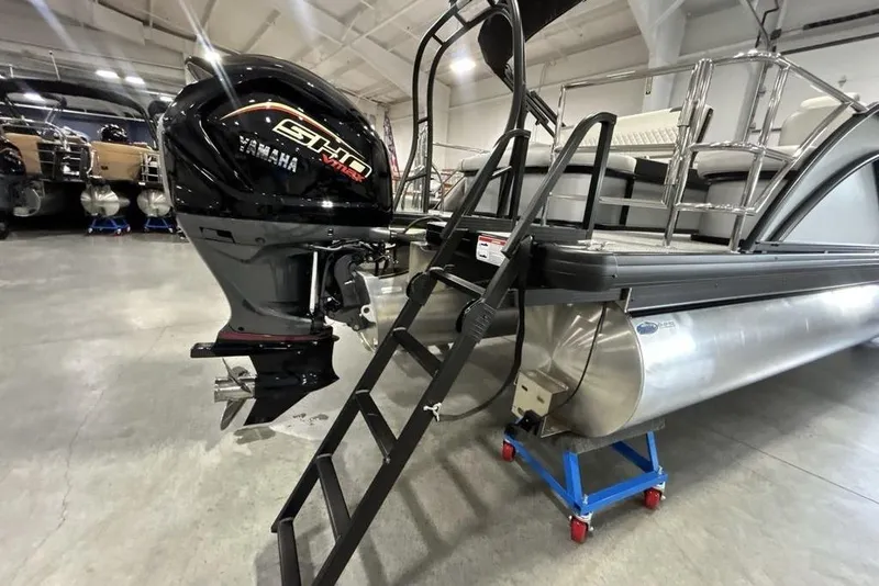Slide: The Image of 2026 Godfrey Sweetwater 2286 SFL pontoon boat with Yamaha motor in showroom. - 10