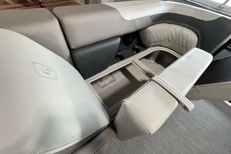 Slide: The Image of Interior seating of 2026 Godfrey Sweetwater 2286 SFL with storage compartment open. - 14