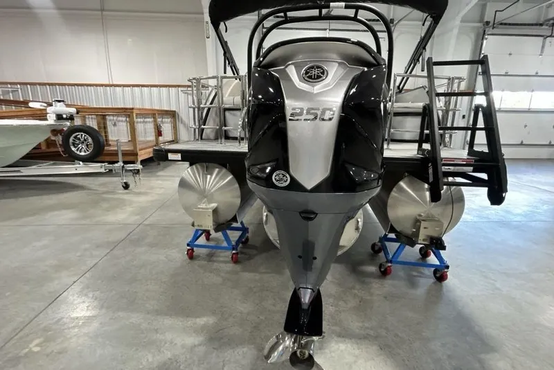 Slide: The Image of 2026 Godfrey Sweetwater 2286 SFL boat with 250 HP engine in showroom. - 6