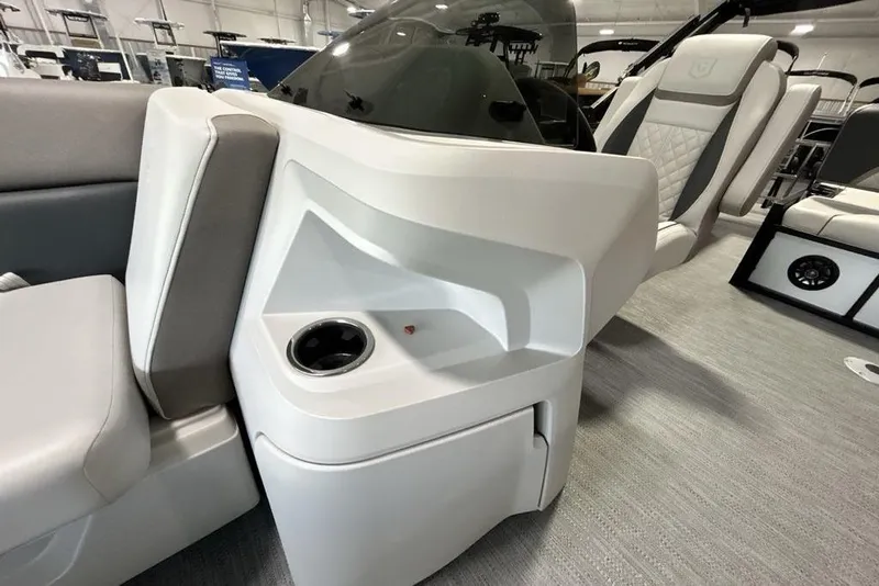 Slide: The Image of Interior of 2026 Godfrey Sweetwater 2286 SFL boat, featuring seating and cup holder. - 16