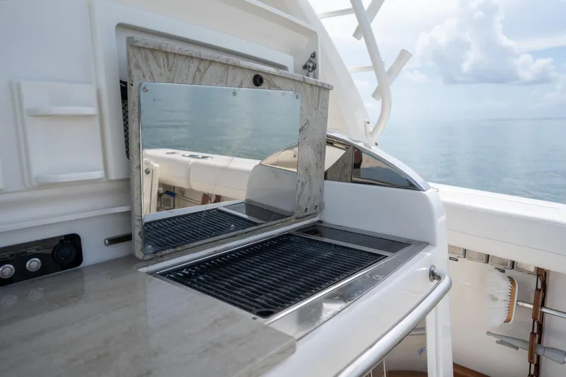 Slide: The Image of Outdoor grill on 2017 Boston Whaler 420 Outrage yacht, ocean view in background. - 29