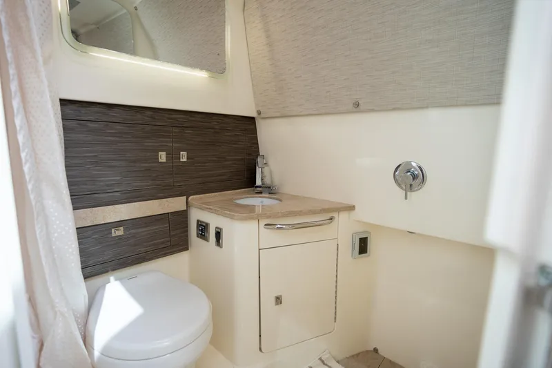 Slide: The Image of Luxurious bathroom interior of 2017 Boston Whaler 420 Outrage yacht, featuring modern amenities. - 19