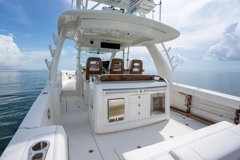 Slide: The Image of 2017 Boston Whaler 420 Outrage boat interior with seating and ocean view. - 27