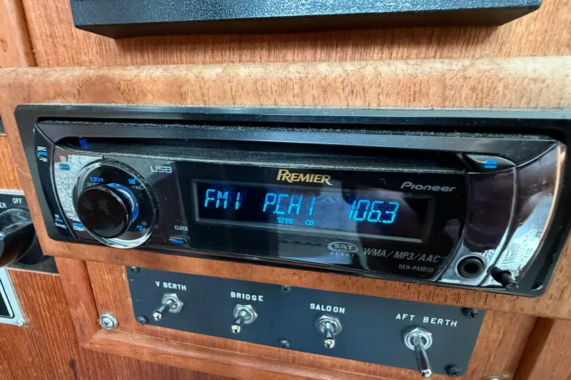 Slide: The Image of Pioneer radio system on 1985 Tollycraft 34 Sundeck Motor Yacht dashboard. - 21