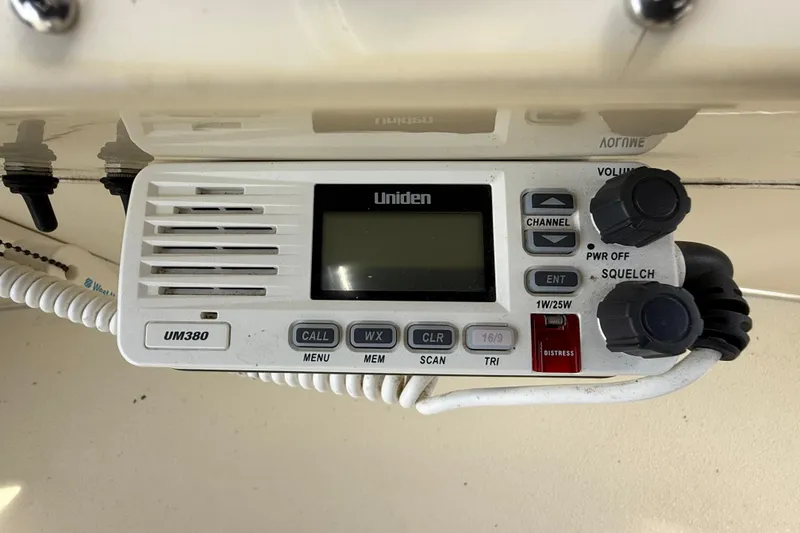 Slide: The Image of Uniden UM380 marine radio on 1985 Tollycraft 34 Sundeck Motor Yacht dashboard. - 16