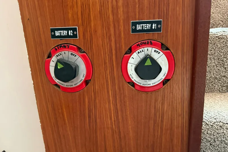 Slide: The Image of Battery switches on 1985 Tollycraft 34 Sundeck Motor Yacht, labeled "Battery #1" and "Battery #2". - 34