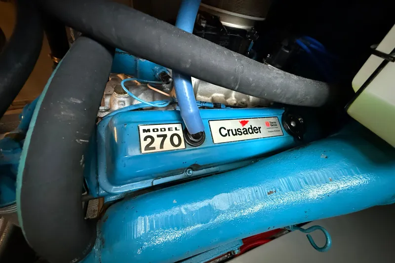 Slide: The Image of Engine of 1985 Tollycraft 34 Sundeck Motor Yacht, Crusader Model 270, blue components. - 47
