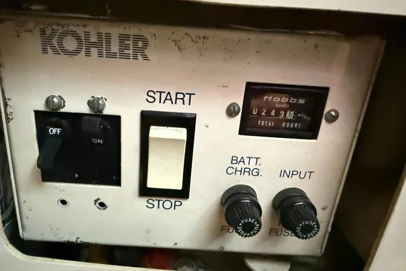Slide: The Image of Control panel of a Kohler generator on a 1985 Tollycraft 34 Sundeck Motor Yacht. - 42