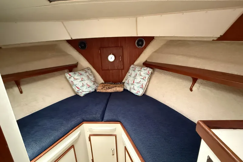 Slide: The Image of Interior cabin of 1985 Tollycraft 34 Sundeck Motor Yacht with cozy bedding and nautical decor. - 37