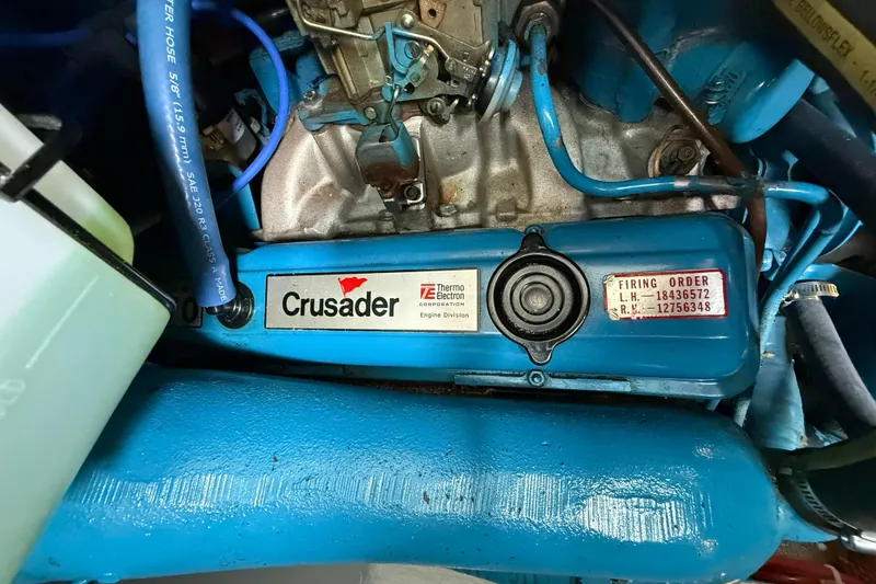 Slide: The Image of Engine of 1985 Tollycraft 34 Sundeck Motor Yacht with Crusader branding. - 46