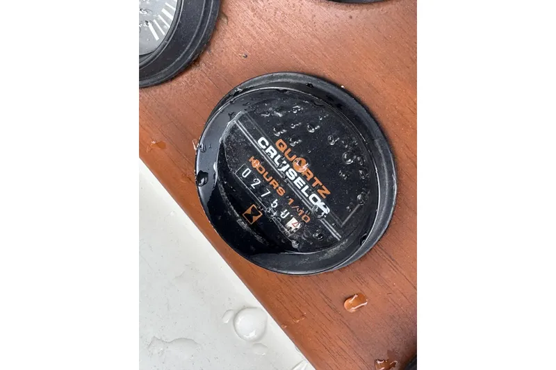 Slide: The Image of Close-up of a wet gauge on a 1983 Boston Whaler 21 Outrage boat. - 10