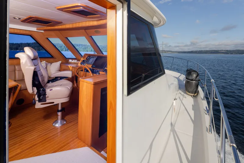 Slide: The Image of Pilothouse interior of 2000 Symbol 50 yacht with scenic ocean view. - 10