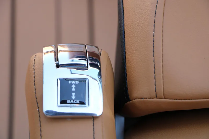 Slide: The Image of Close-up of 2026 Chaparral 30 Surf throttle control with leather upholstery. - 45