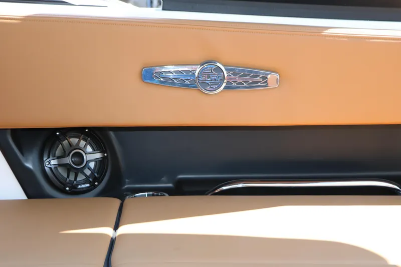 Slide: The Image of Interior detail of 2026 Chaparral 30 Surf boat with speaker and emblem. - 36
