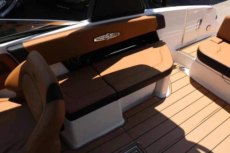 Slide: The Image of Luxurious seating on 2026 Chaparral 30 Surf boat with tan upholstery and sleek design. - 30