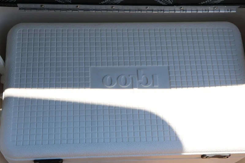 Slide: The Image of White Igloo cooler on Chaparral 30 Surf boat, 2026 model. - 37