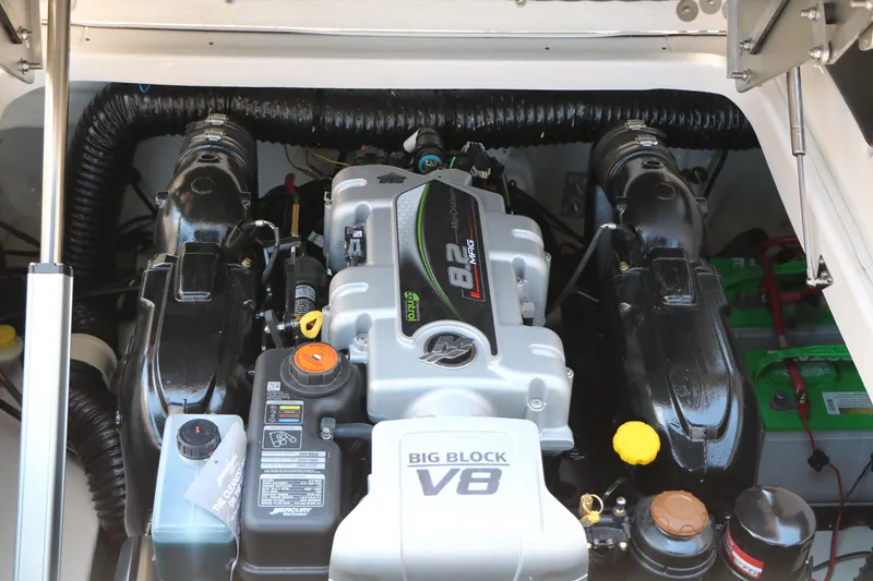 Slide: The Image of Engine compartment of 2026 Chaparral 30 Surf boat featuring a powerful V8 engine. - 38