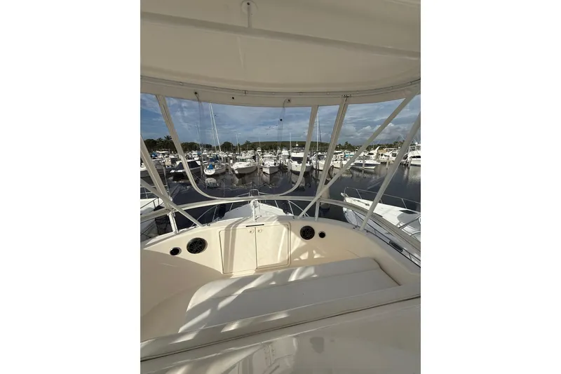 Slide: The Image of 2005 Riviera 40 Flybridge yacht interior with marina view. - 33
