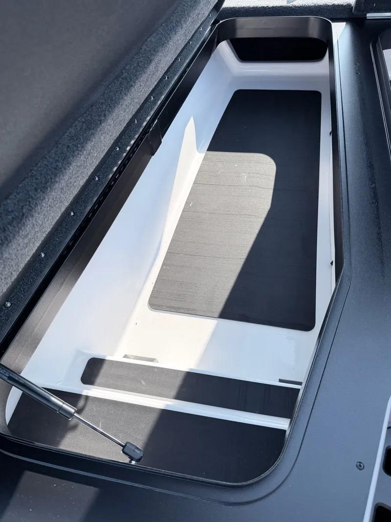 Slide: The Image of Interior view of a Skeeter ZXR20 SE boat with storage compartment. - 19
