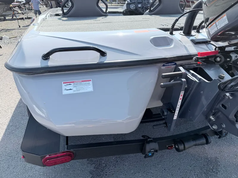 Slide: The Image of The image shows the rear of a Skeeter ZXR20 SE boat on a trailer. - 23