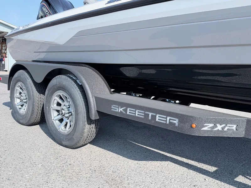 Slide: The Image of A Skeeter ZXR20 SE boat on a trailer, ready for transport. - 31