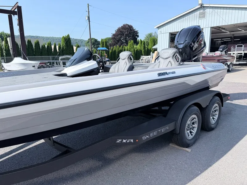 Slide: The Image of A modern 2026 Skeeter ZXR20 SE on a trailer, ready for the water. - 6